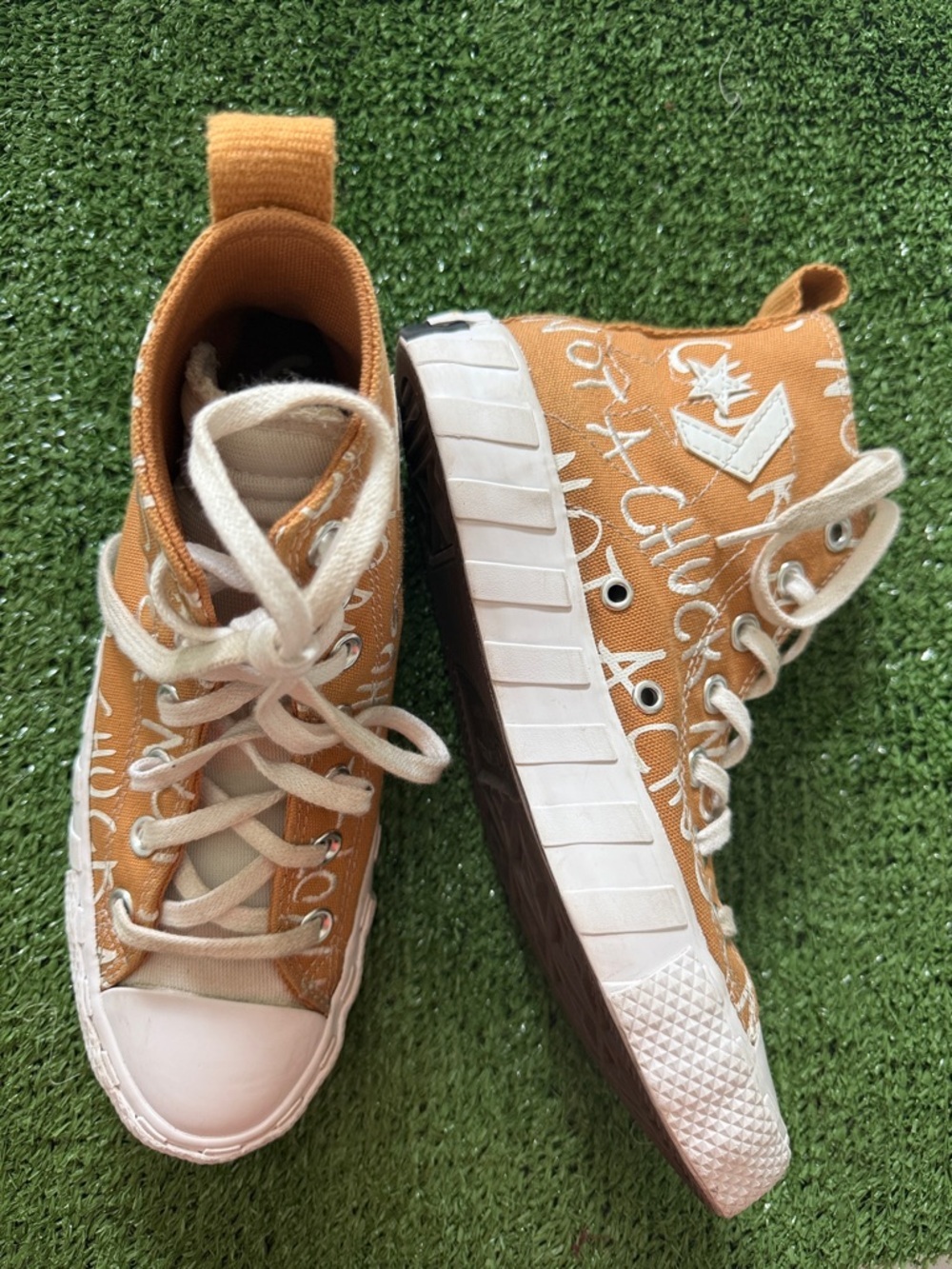 Kids Converse UNT1TL3D High 'Not A Chuck' sneakers in Golden Tan/White.